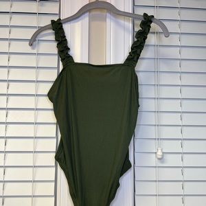 Green ribbed body suit